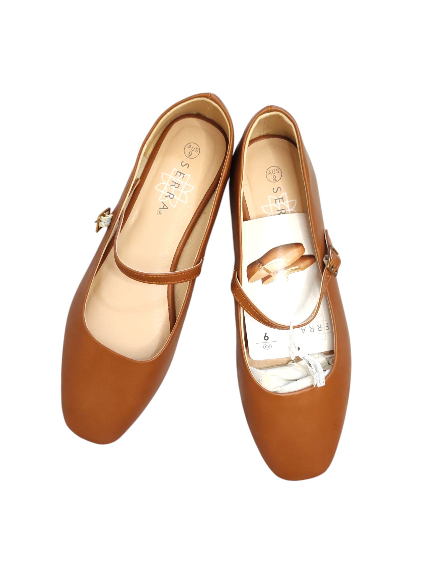 Tan Mary Jane–style flats