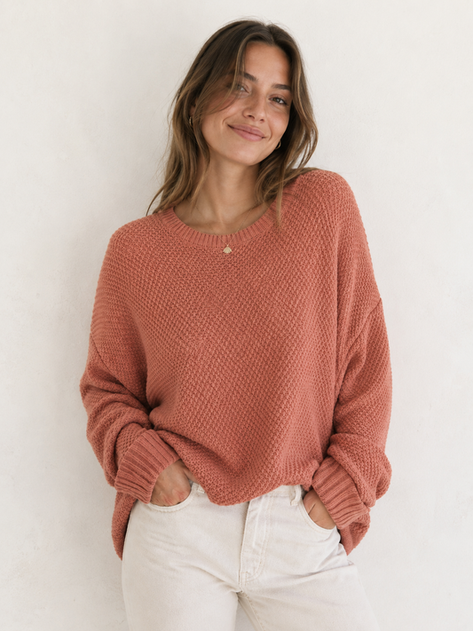 Terracotta knit jumper with a relaxed oversized fit