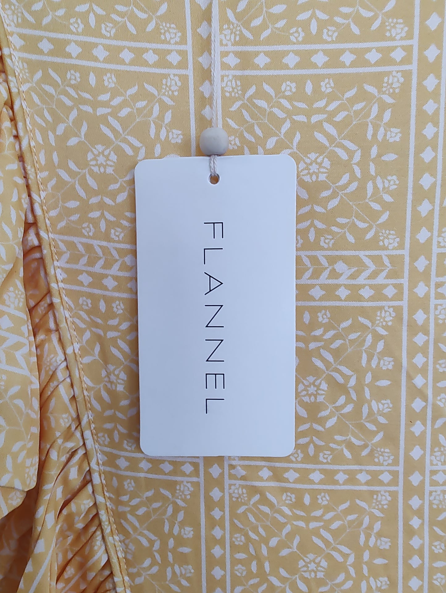 Yellow Ruffle Print Sleeveless Blouse