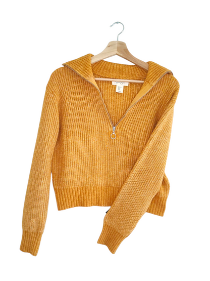 Yellow half zip sweater in soft knit fabric.